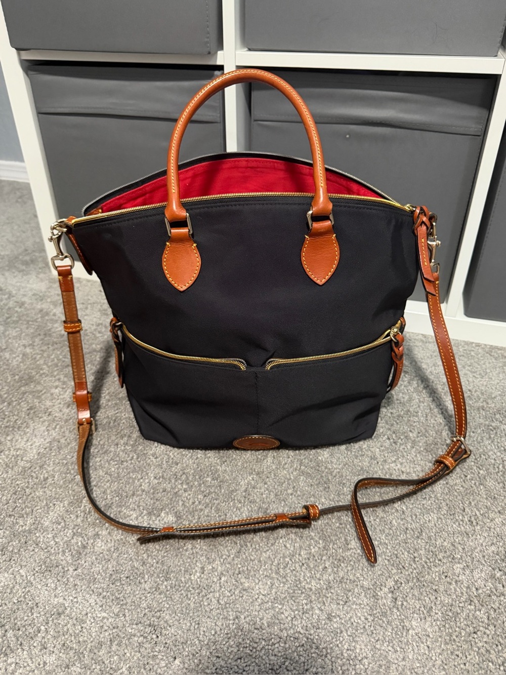 Dooney & Bourke Black Tote with Brown Leather Trim and Red Interior Lining